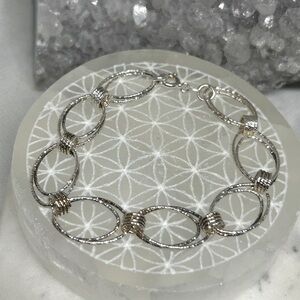 Elegant Sterling Silver Diamond Cut Bracelet